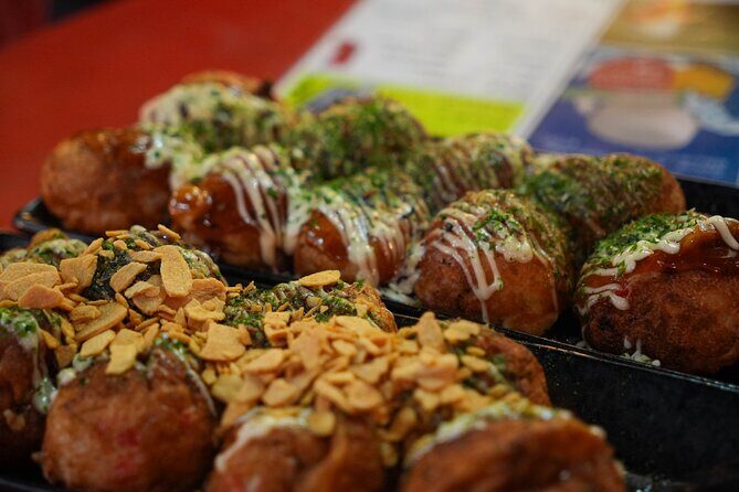 [1 Group Only] Osaka Street Food Tour for Family - A second Shinsekai pass for that old-school Osaka feel