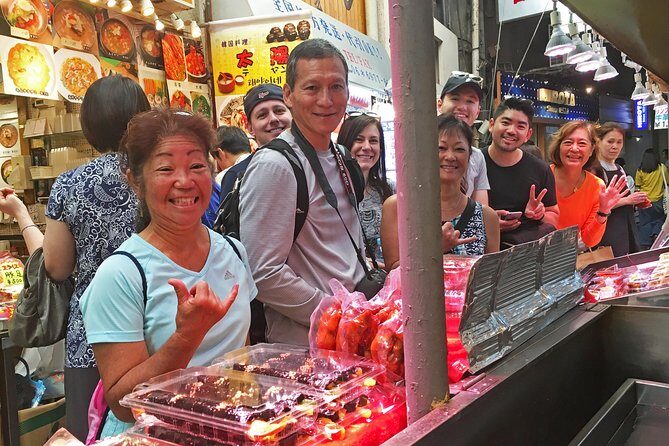 Eat, Drink & Cycle: Osaka Foodie Bike Tour - Tsuruhashi Market snack time: how the guide keeps it local