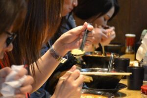 Evening Street Food Hopping Tour in Downtown Osaka - The izakaya-style stop: beer, sake, and the Osaka pub rhythm