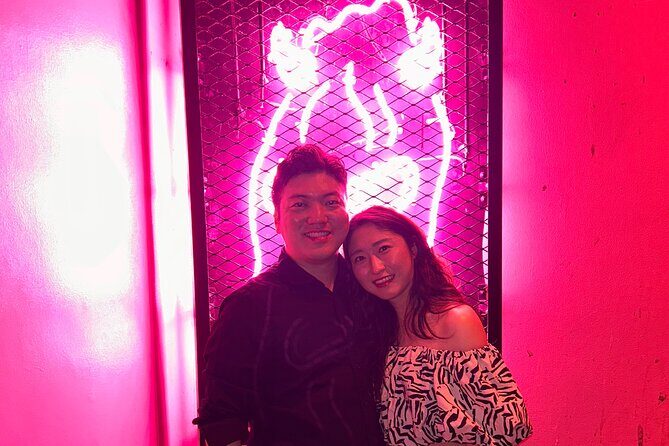 Hidden Gems and Bustling Districts of Osaka Night Tour - Stop 2: The Pink and its famous LED show