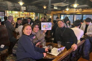 Meet Osaka locals and Japanese speaking experience at Pub Umeda - The conversation system: topics cards and real seat movement