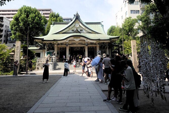 Osaka 4-Hour Walking Tour: Hotspots and Hidden Gems - Namba Yasaka Shrine: The 12-Meter Lion Head Photo Stop