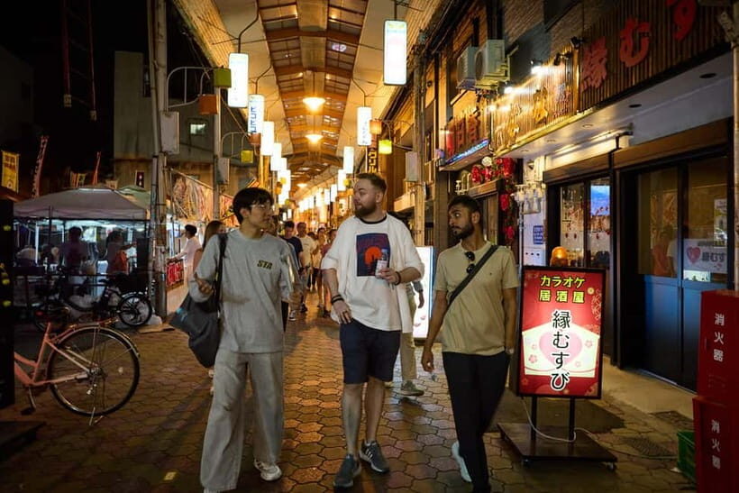 Osaka: Dark Side of Osaka Night Walking Tour - Tsūtenkaku: The Landmark That Anchors the Night