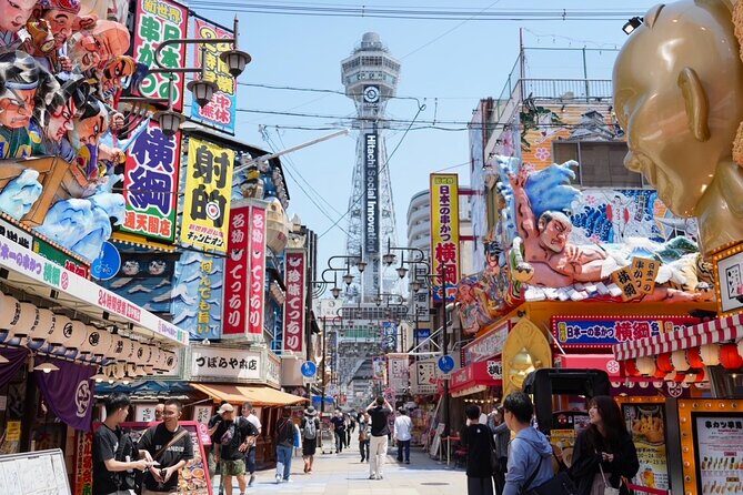 Osaka Early Morning Tour with English-Speaking Guide Dotonbori - Osaka Castle grounds: iconic views without the extra ticket pressure