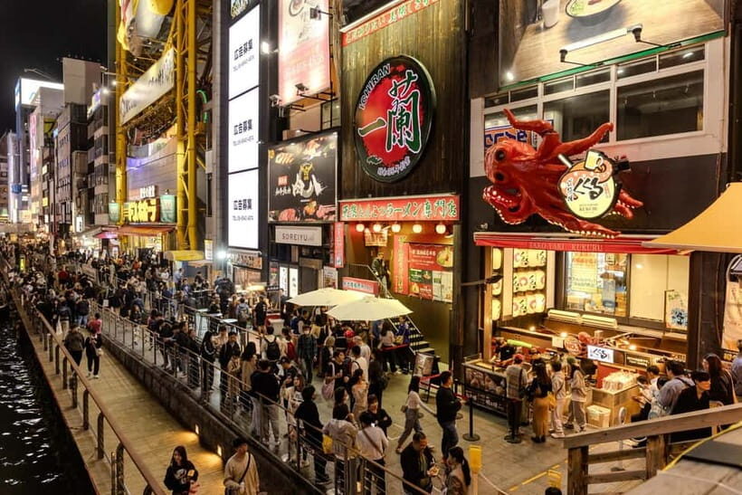 Osaka: Food Tour Kuromon Market & Dotonbori with Guide - Dotonbori Neon Walk and Ebisu Bridge Glico Sign Photo