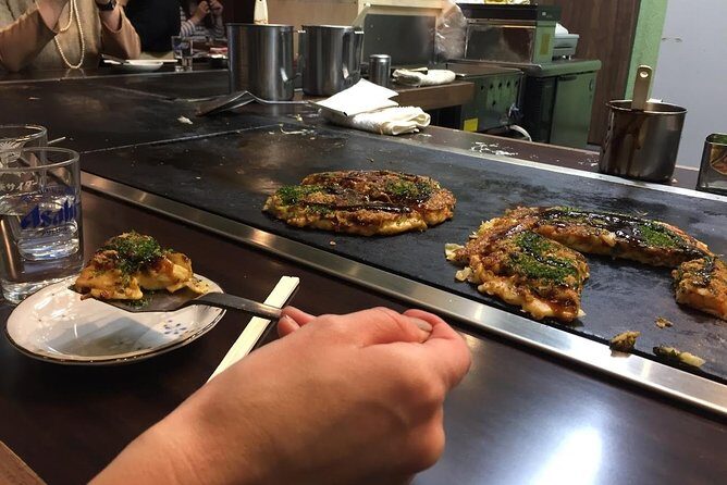 Osaka Food Walking Tour with Market Visit - Shinsekai Lunch and the Okonomiyaki Cabbage Pancake Moment