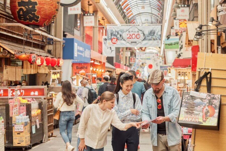 Osaka: Highlights & Hidden Gems Private Walking Tour - Dotonbori and the Ebisu-bashi Bridge lights: the iconic Osaka moment