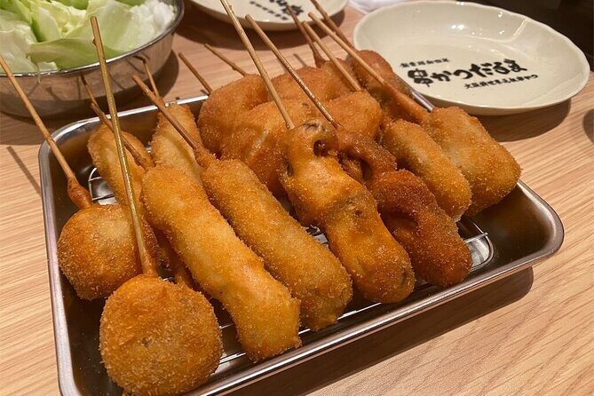 Osaka Highlights Walking Tour: Castle, Dotonbori & Hidden Gems - Tsutenkaku and Shinsekai: Retro Osaka’s Iconic Tower Finish