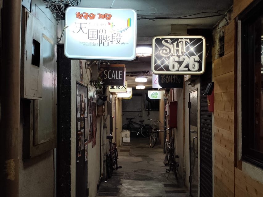 Osaka: LGBTQ+ Tour with Dinner and Drinks - Doyama district: rainbow cues, bar clusters, and your two included drinks