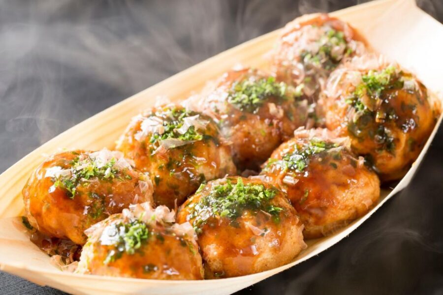 Osaka: Local Foodie Tour in Dotonbori and Shinsekai - The 1.2-meter alley and temple pause between neon streets