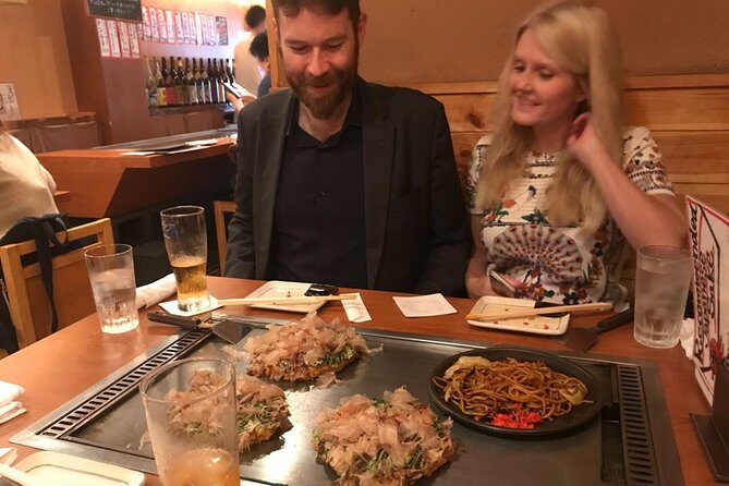Osaka Local Foodie Walking Tour in Dotonbori and Shinsekai - Stop by stop: Tsutenkaku and Jan-Jan Yokocho kushikatsu