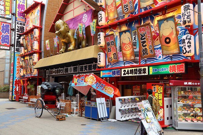 Osaka Private Pop Culture Tour: Historic Tenma to Dotonbori - Retro neon and fried skewers: the Osaka attitude zone