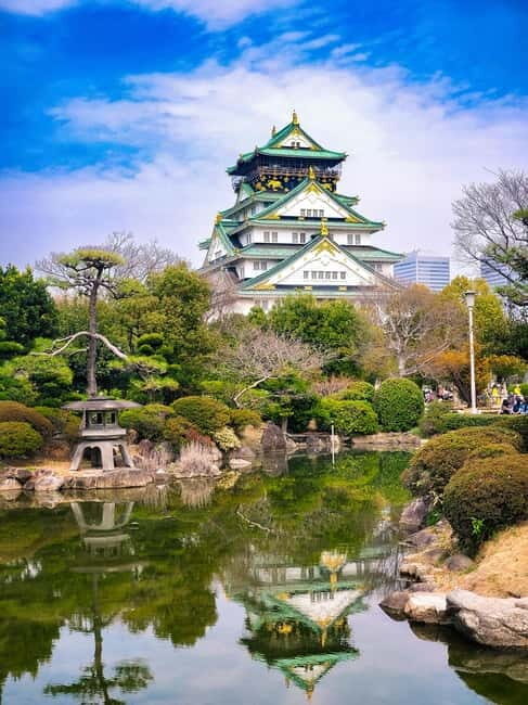 Osaka: Walking Tour and Top Highlights - Kuromon Ichiba Market: Plan Your Snack Strategy, Then Eat Well