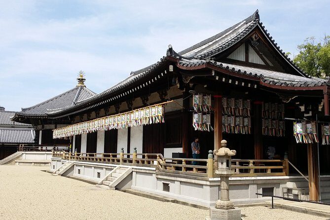 Osaka’s Best and Brightest: Private Full-Day Tour by Vehicle - Shinsekai: retro streets, games, and snack energy
