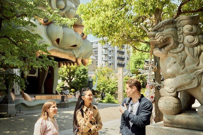Private Osaka Walking Tour: Highlights & Hidden Gems - Umeda and shopping arrows: White Umeda, department stores, and a main arcade